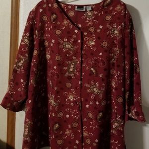 Ruffled sleeved button down blouse.